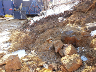 Graphite vein boulder found during build out of road to new drill hole location.